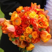Bridal Bouquet Bursting with Rich Orange Tones