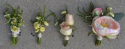Left to Right-- Groom Boutonniere, Groomsmen Boutonniere, Father Boutonniere, Mother Corsage